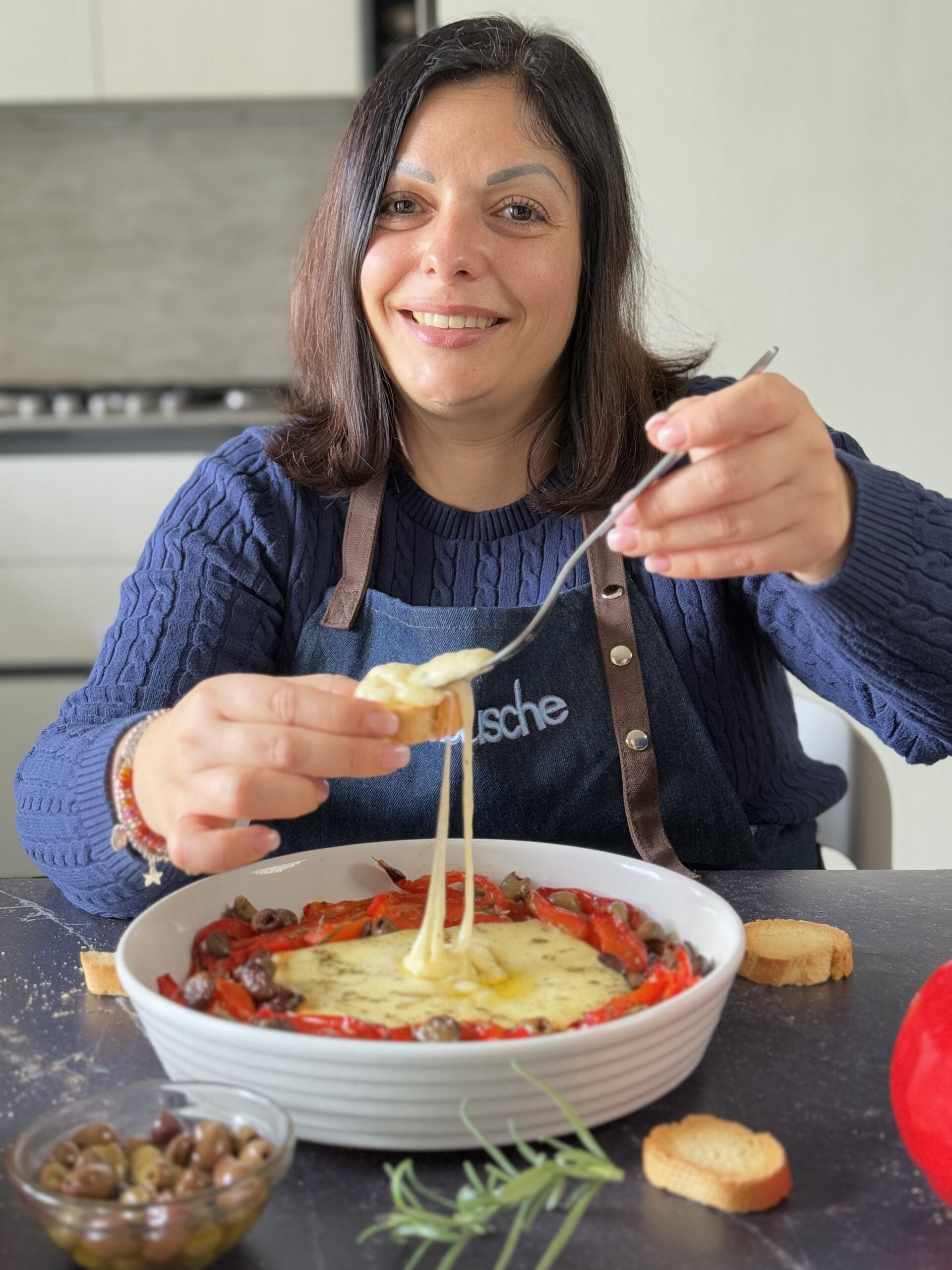Fettacotta al forno con peperoni e olive